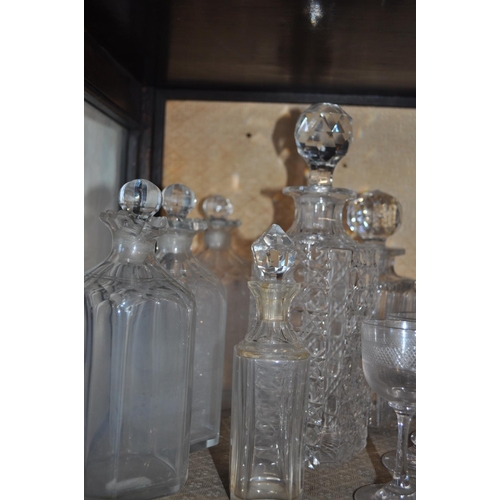 25 - A selection of decanters/bottles with stoppers and other glassware items together with Pall Mall she... 