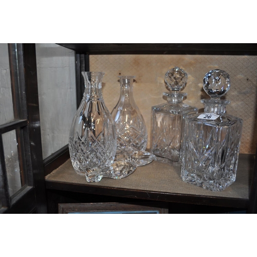 26 - Two pairs of crystal decanters with stoppers