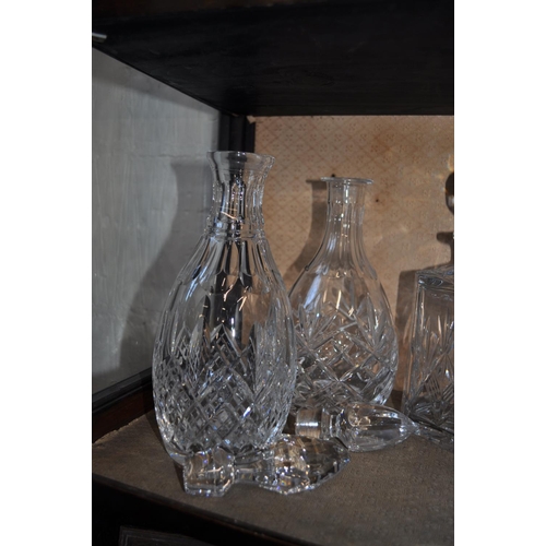 26 - Two pairs of crystal decanters with stoppers