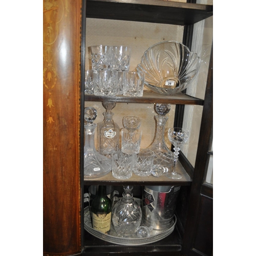 28 - A large selection of bar/drinking items including ice buckets, decanters, trays and glasses, bowl et... 