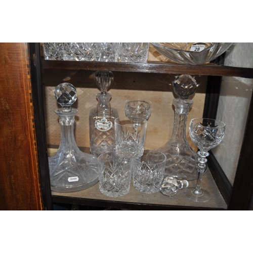 28 - A large selection of bar/drinking items including ice buckets, decanters, trays and glasses, bowl et... 