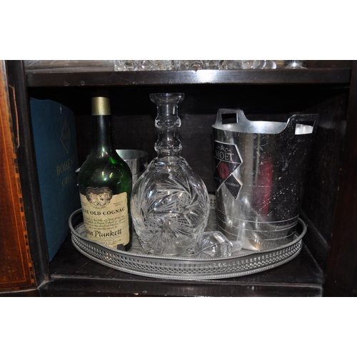 28 - A large selection of bar/drinking items including ice buckets, decanters, trays and glasses, bowl et... 