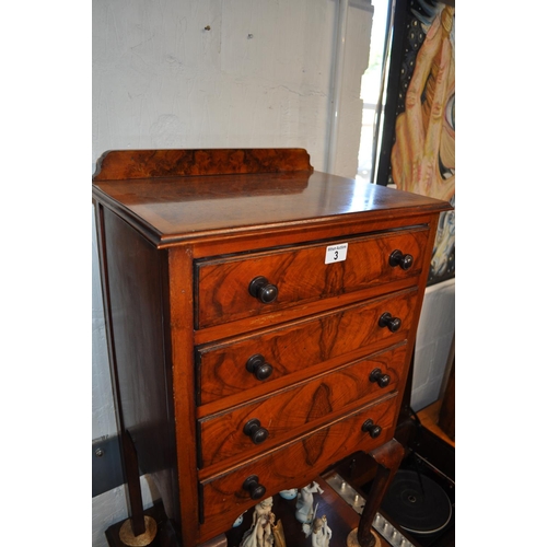 3 - Walnut veneered four drawer music cabinet with Queen Anne style front legs