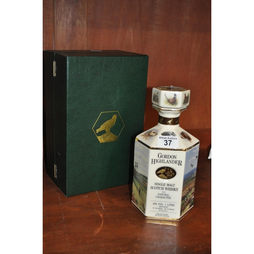 37 - A 1 litre decanter of Gordon Highlander 12 year old Scotch in presentation box