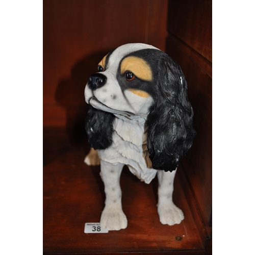 38 - Resin dog in the form of a King Charles Spaniel, measuring approx H 29cm