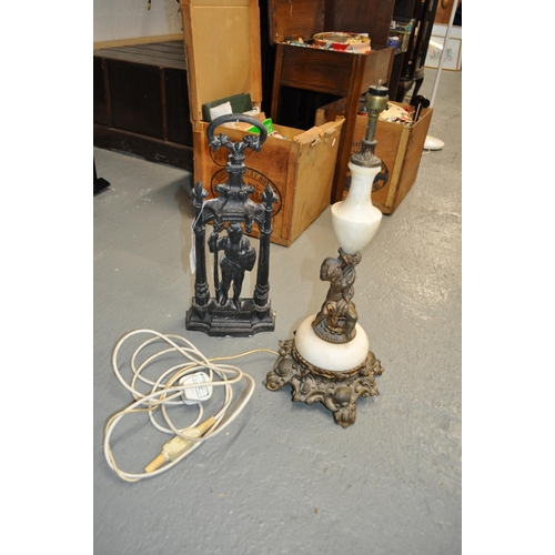 45 - Onyx and brass table lamp with cherub design (PAT tested)  together with heavy cast iron door depict... 