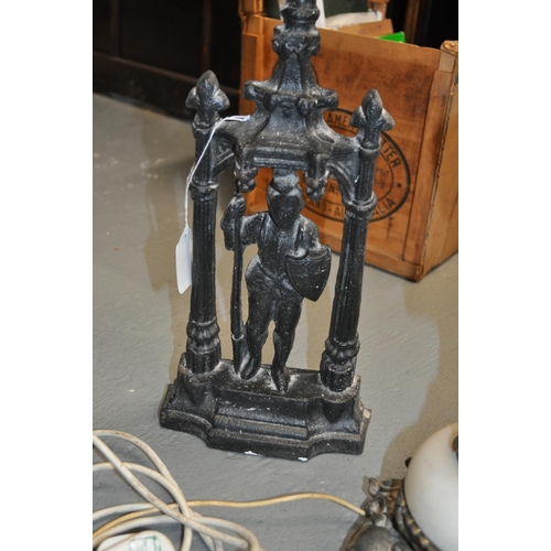 45 - Onyx and brass table lamp with cherub design (PAT tested)  together with heavy cast iron door depict... 