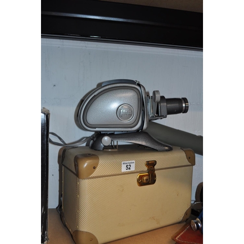 52 - A Noris projector in original carrying case (with key) together with projector screen