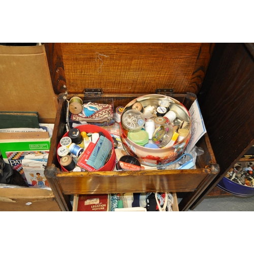 63 - Two 'Australian Butter' boxes and sewing table containing a large assortment of retro sewing/haberda... 