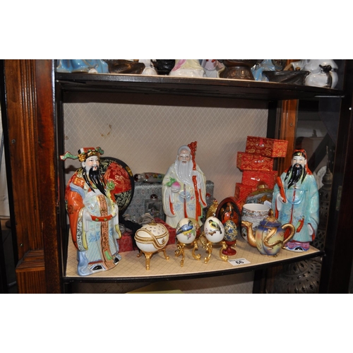 66 - Oriental themed items consisting of scent bottles, figurines and decorative eggs etc.