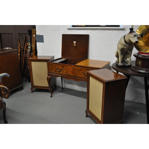 7 - A Dynatron Radiogram and Garrard record player in a cased burr walnut unit together with matching sp... 