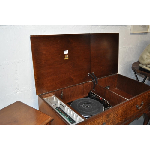 7 - A Dynatron Radiogram and Garrard record player in a cased burr walnut unit together with matching sp... 