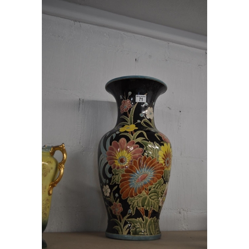 71 - A large ceramic display vase depicting vibrant flowers, overall height 54cm