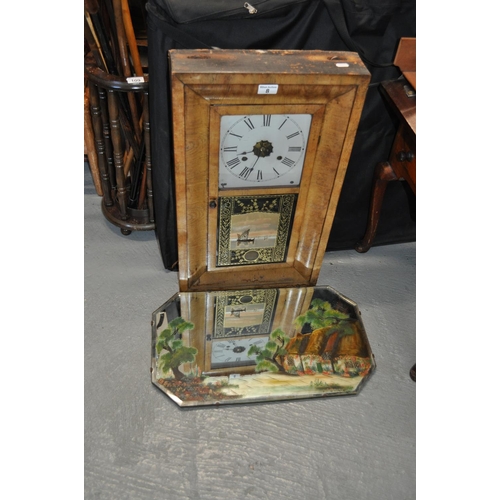 8 - Jerome & Co 30 hour wall clock, with reverse painted lower glass panel together with a vintage mirro... 