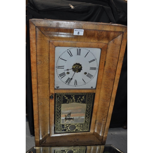 8 - Jerome & Co 30 hour wall clock, with reverse painted lower glass panel together with a vintage mirro... 