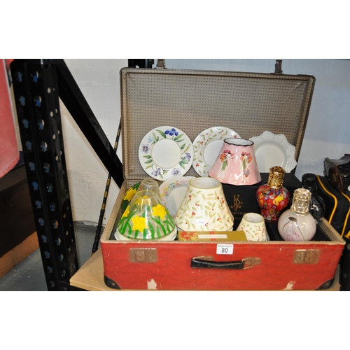 80 - Retro suitcase containing a quantity of Yankee Candle items including ceramic and glass holders and ... 