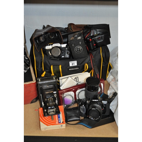 81 - A bag containing Retro camera items  including a Brownie, Kodak A120 in canvas case, Fujinar Z 200mm... 