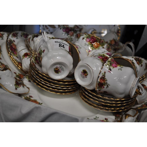 84 - A box of Royal Albert Country Roses porcelain items including; large and small teapots, cups, saucer... 