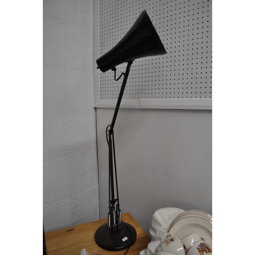 85 - A brown angle poise lamp with blue tinged bulb