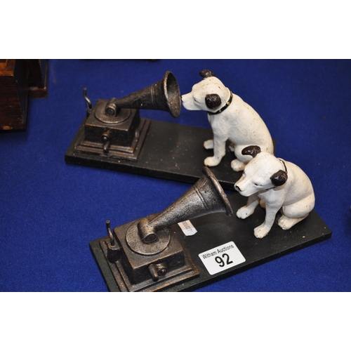 92 - A pair of cast iron his masters voice doorstops/bookends/paperweights