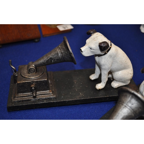 92 - A pair of cast iron his masters voice doorstops/bookends/paperweights