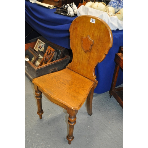 94 - Two antique shield back wooden chairs