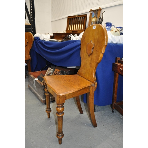 94 - Two antique shield back wooden chairs