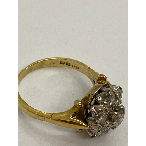 308 - 18ct gold and diamond cluster ring, hallmarked London, approx size K, approx 0.45 total CT