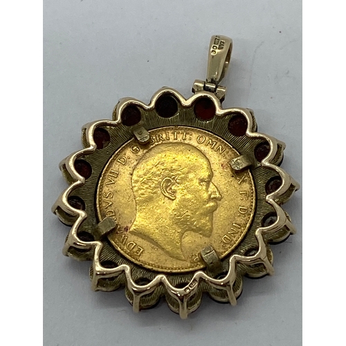 312 - 9ct yellow gold coin holder pendant  containing a 22ct gold Edward VII 1906 half sovereign, mounted ... 