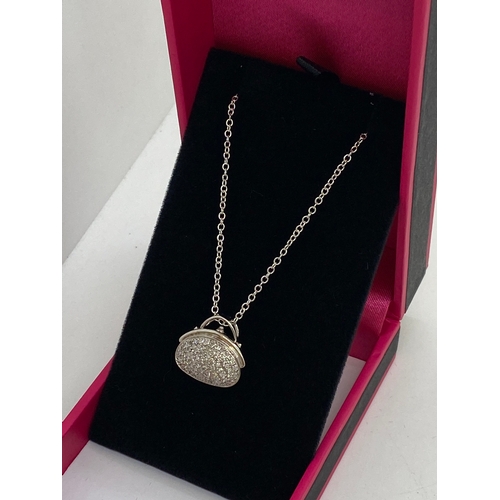 313 - Unusual 14k white gold diamond pave set pendant necklace in the form of a handbag on chain. Approx l... 