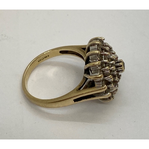 309 - A 9ct yellow gold CZ cluster ring, approx size M, Hallmarked London 375, makers stamp LMJ, approx we... 