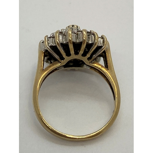 309 - A 9ct yellow gold CZ cluster ring, approx size M, Hallmarked London 375, makers stamp LMJ, approx we... 