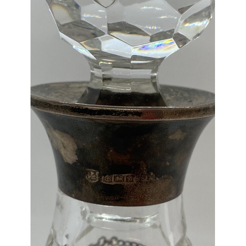 270 - A cut-glass decanter with faceted topper and silver collar hallmarked Birmingham 1973-4, together wi... 