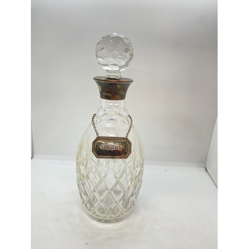 270 - A cut-glass decanter with faceted topper and silver collar hallmarked Birmingham 1973-4, together wi... 