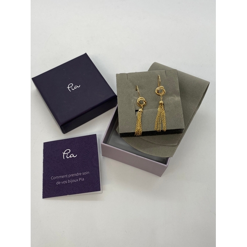 147 - A pair of 9ct yellow gold drop earrings, by PIA