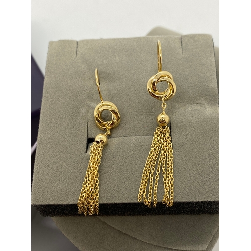 147 - A pair of 9ct yellow gold drop earrings, by PIA