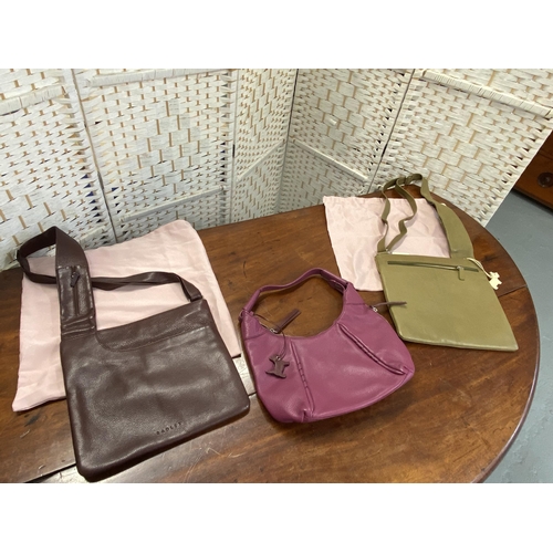 16 - Three genuine Radley leather handbags