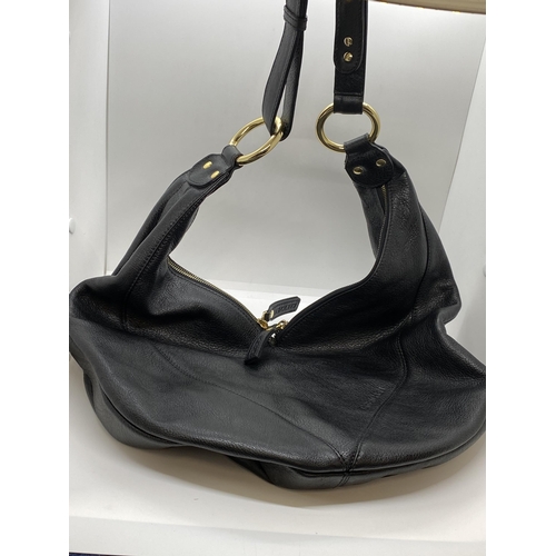 19 - Genuine designer shoulder/handbag by Gretchen 'The Little Pearl' black leather with gold tone hardwa... 