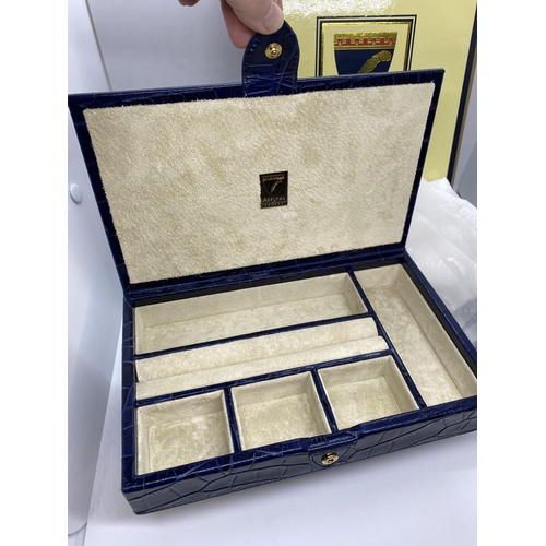 21 - Aspinal of London leather jewellery box, unused and with original box and packaging, in the rare blu... 