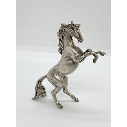 272 - A silver Arabian Stallion in a rearing stance, approx weight 105g