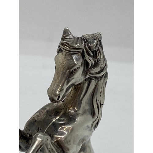 272 - A silver Arabian Stallion in a rearing stance, approx weight 105g