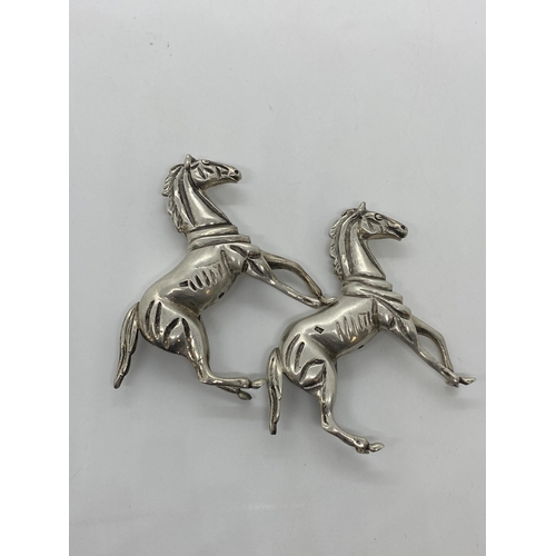 273 - A pair of silver horse figures, approx combined gross weight 180g