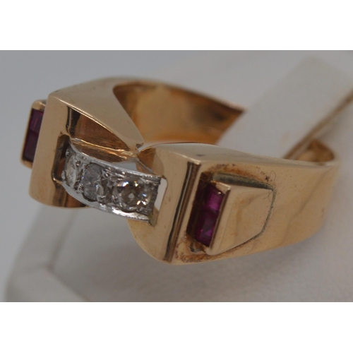 110 - 18ct yellow gold tank ring with three clear stones to central bridge design and two square cut red s... 