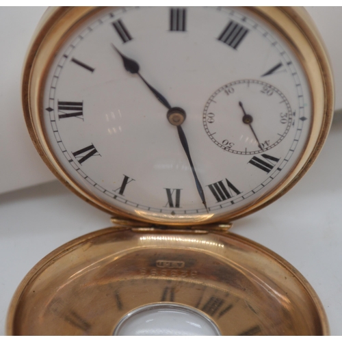 153 - A 9ct gold half-hunter pocket watch, the  case hallmarked for A.L.D 323999, hallmark Birmingham 1925... 