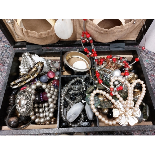 230 - A large quantity of costume jewellery including jewellery boxes, rings, earrings necklaces, brooches... 