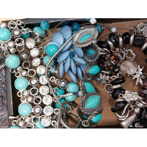 230 - A large quantity of costume jewellery including jewellery boxes, rings, earrings necklaces, brooches... 