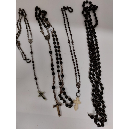 236 - A trio of vintage rosaries together with a faceted necklace (possibly French jet)