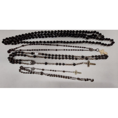 236 - A trio of vintage rosaries together with a faceted necklace (possibly French jet)