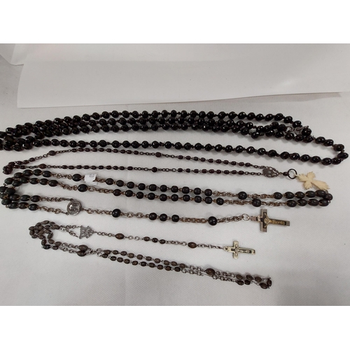 236 - A trio of vintage rosaries together with a faceted necklace (possibly French jet)