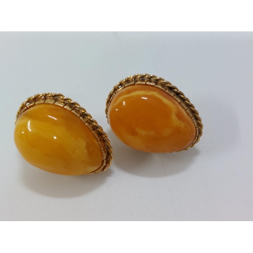 245 - Amber and unmarked gold coloured earrings